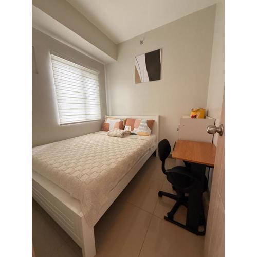 Urban Oasis 2BR Condo with Multiple Pools at SMDC Charm Residences