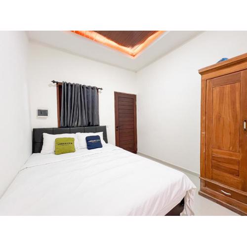 Urbanview Hotel Arta Guna Casa