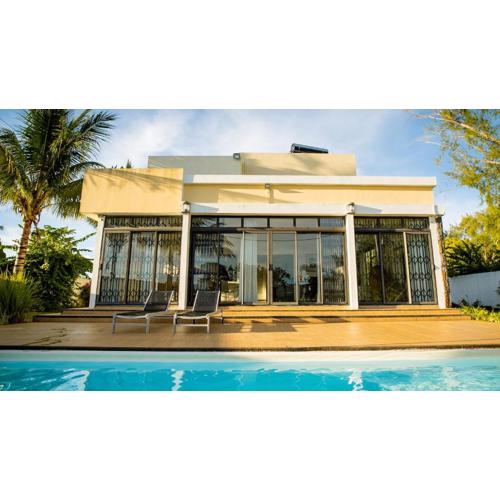 Villa Angelou - Sunlit Beach Getaway with Pool and WIFI