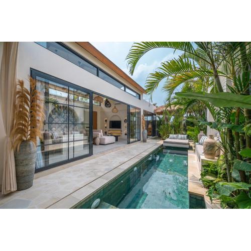 Villa Isly - Stylish 2BR Villa with BBQ, Rooftop and Beach Nearby