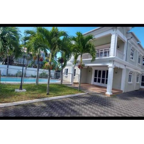 Villa Palmira 6 suites avec piscine 5 min à pied de la plage Pereybere