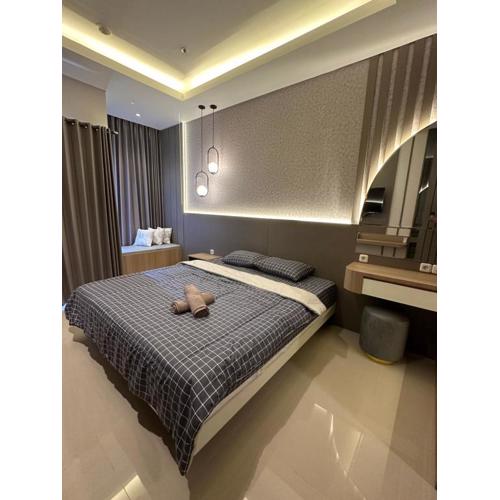 Vittorio Apartment Wiyung 1BR sby wifi smtv by ASH