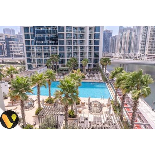 VOGUE DAMAC Maison Prive Spacious Corner One Bedroom Apartment with Full Canal View and 2 Balconies located 20th Floor with Pool and GYM Access