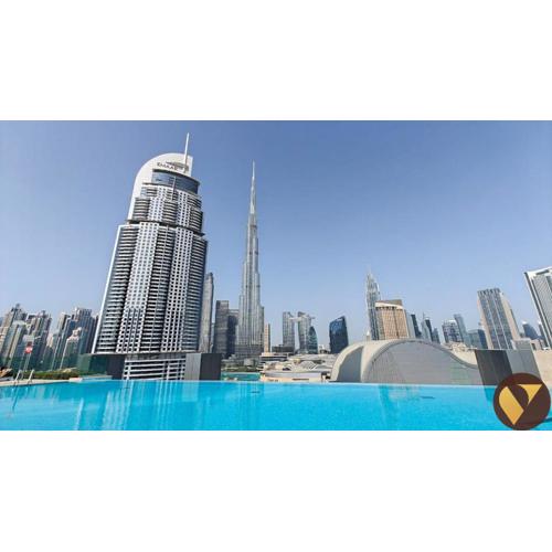 Vogue Downtown Luxury one Bedroom Apartment with Burj Khalifa View from the Balcony and full Amenities Steps Away from Dubai Mall