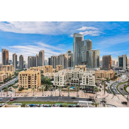 Walk to Burj Khalifa from this 2BR with Skyline Balcony View