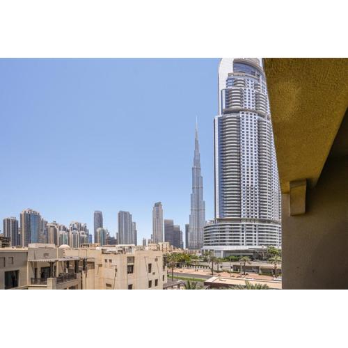 Walk to Dubai Mall chic 2BR with full Burj view