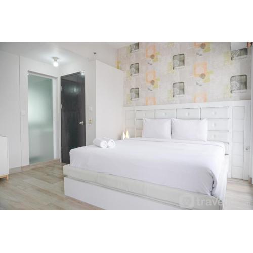Warm and Comfort Living 1BR at 8th Ambassade Kuningan Apartment By Travelio