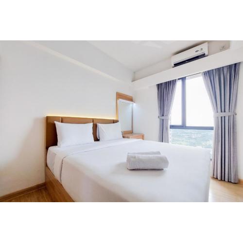 Warm and Comfort Stay 2BR at Sky House BSD Apartment By Travelio