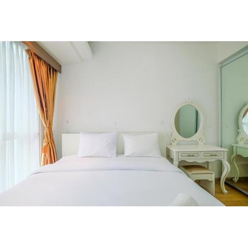 Warm and Comfy 2BR Apartment at Casa Grande Residence By Travelio