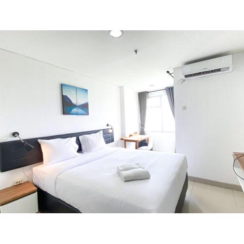 Warm and Comfy Studio at Enviro Apartment By Travelio