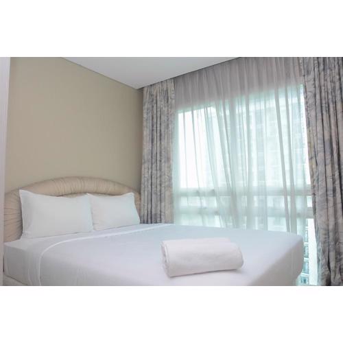 Warm and Cozy 2BR Apartment Woodland Park Residence By Travelio