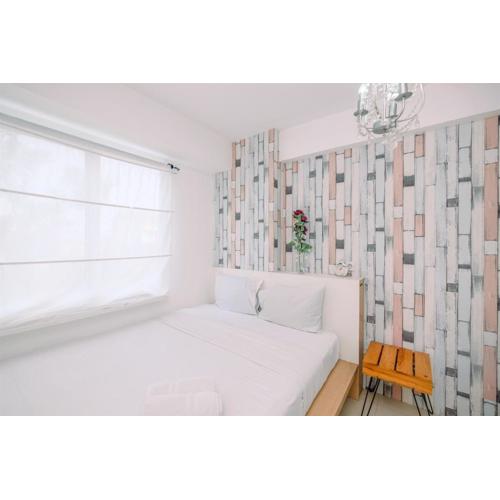 Warm and Cozy 2BR at Low Floor Bassura City Apartment By Travelio