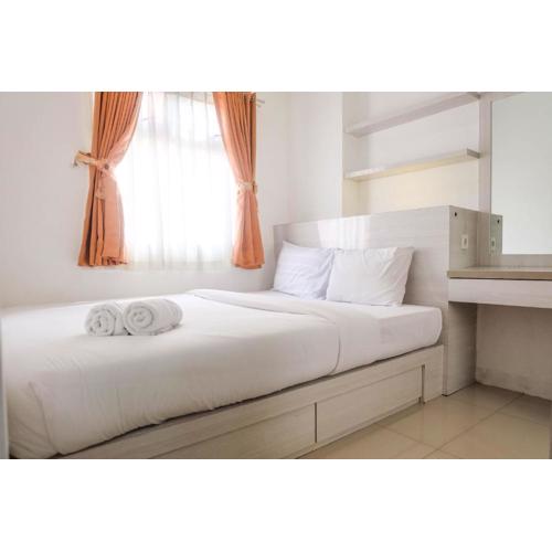 Warm and Cozy 2BR Green Pramuka Apartment near Mall By Travelio