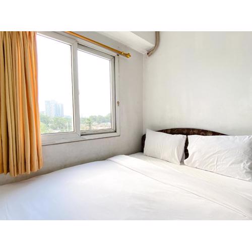 Warm and Cozy 2BR Mutiara Bekasi Apartment By Travelio