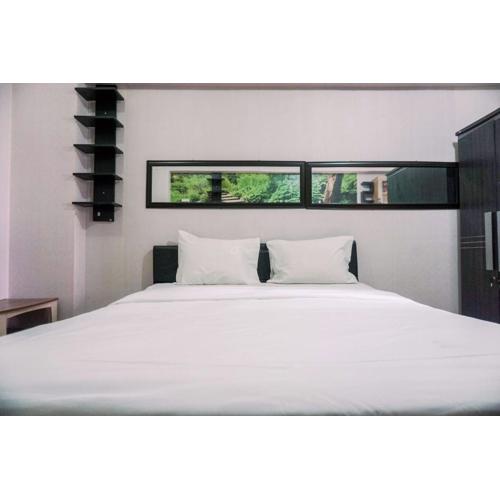 Warm and Cozy Stay Studio Green Bay Pluit Apartment By Travelio