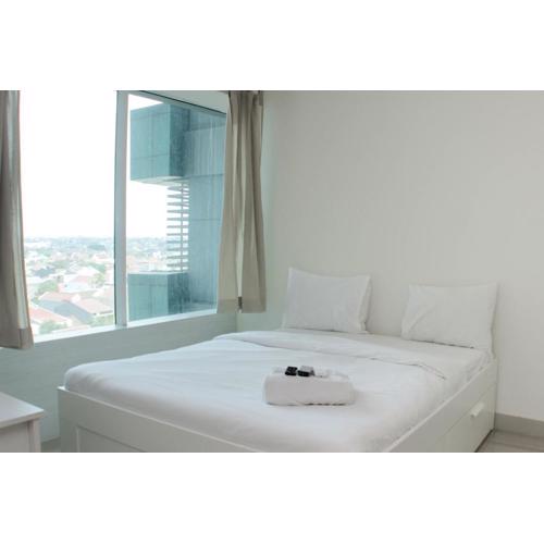 Warm and Cozy Studio at Grand Kamala Lagoon Apartment By Travelio