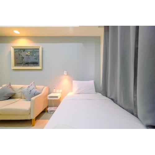 Warm and Cozy Studio Evenciio Apartment Margonda near UI By Travelio