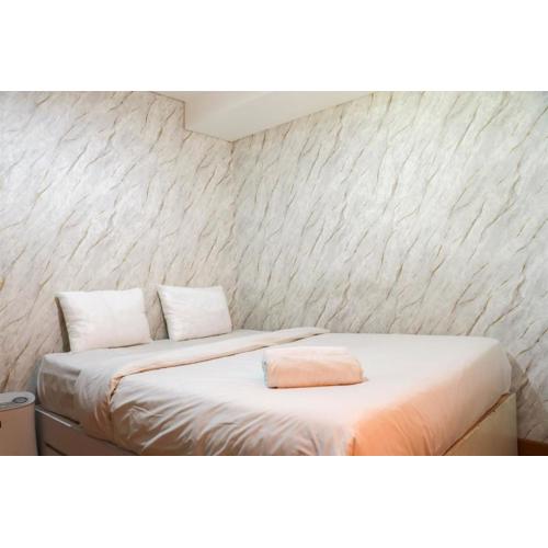 Warm and Homey 2BR at Sentraland Cengkareng Apartment By Travelio