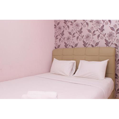 Warm and Homey 2BR at Springlake Summarecon Bekasi Apartment By Travelio