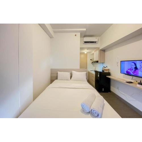 Warm and Homey Studio Tokyo Riverside PIK 2 Apartment By Travelio