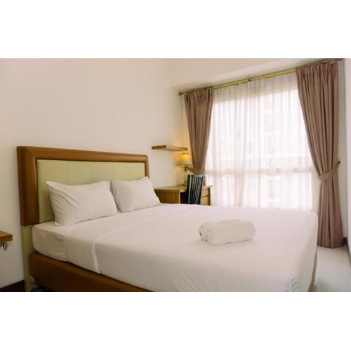 Warm and Minimalist 1BR Apartment at Scientia Residence By Travelio