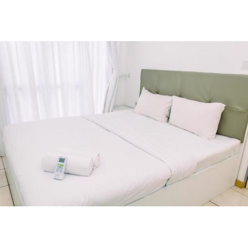 Warm and Minimalist 3BR Apartment at M-Town Residence By Travelio