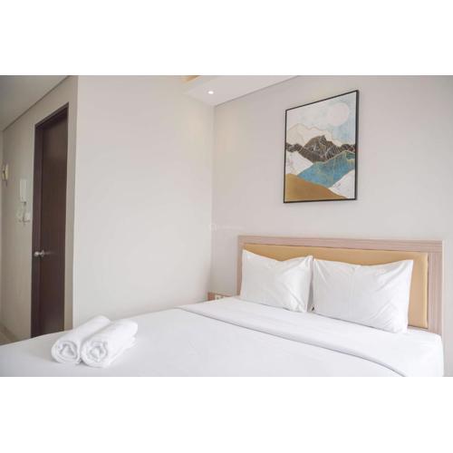 Warm and Minimalist Studio Transpark Bintaro Apartment By Travelio