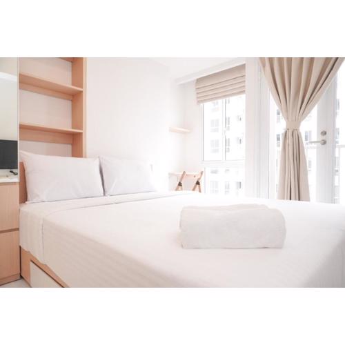 Warm and Simply Studio at Tokyo Riverside PIK 2 Apartment By Travelio