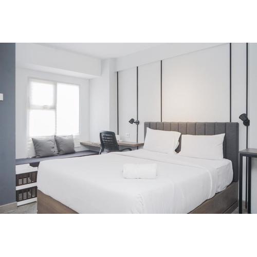 Warm and Simply Studio Room at Urbantown Serpong Apartment By Travelio