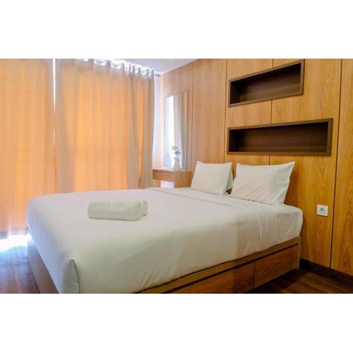 Warm Design Studio Apartment at Casa De Parco By Travelio