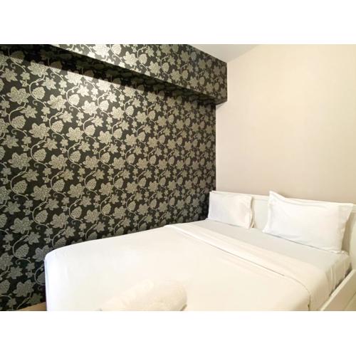 Warm Living and Homey 2BR at Springlake Summarecon Bekasi Apartment By Travelio