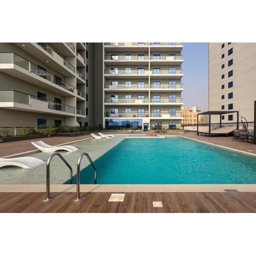 Waves - Stylish 1BR Close to IMG World & Global Village