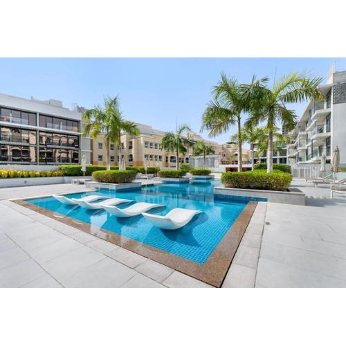 Waves - Stylish 1BR in JVC with Balcony & Pool