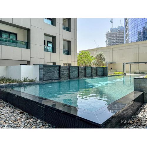 WelHome - Luxury Living in Business Bay 2BR + Maid's Room
