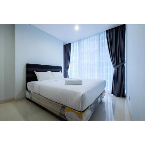Well Furnished 1BR Brooklyn Alam Sutera Apartment By Travelio
