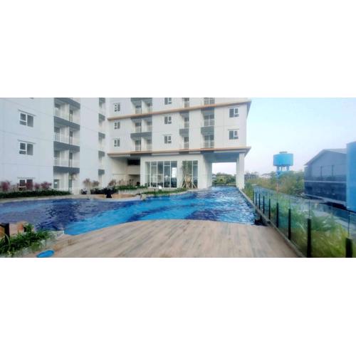 Well Furnished and Homey Studio (No Kitchen) Apartment at Suncity Residence By Travelio