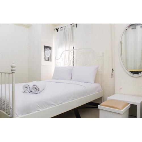 White and Nice 1BR at Bassura City Apartment By Travelio