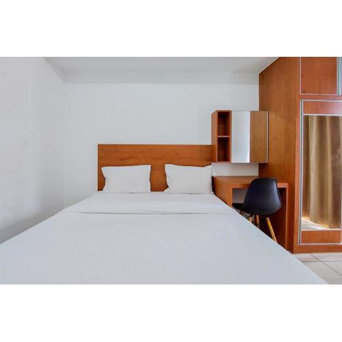 Wonderful 2BR at M-Town Residence near Summarecon Mall By Travelio