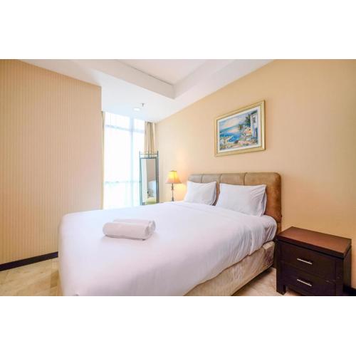 Wonderful and Homey 2BR Apartment Bellagio Residence By Travelio