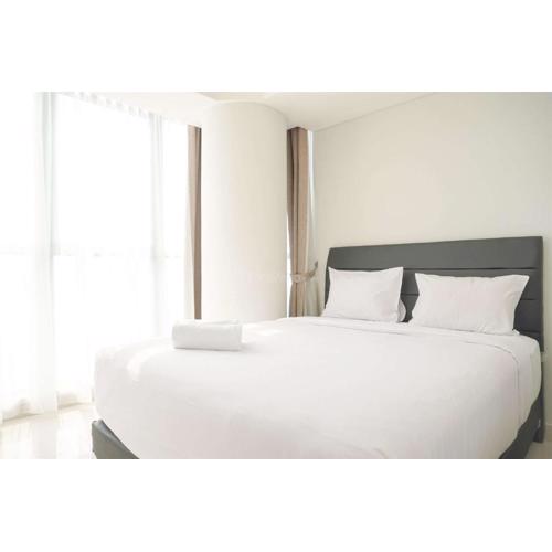 Wonderful and Homey 2BR at Gold Coast Apartment By Travelio