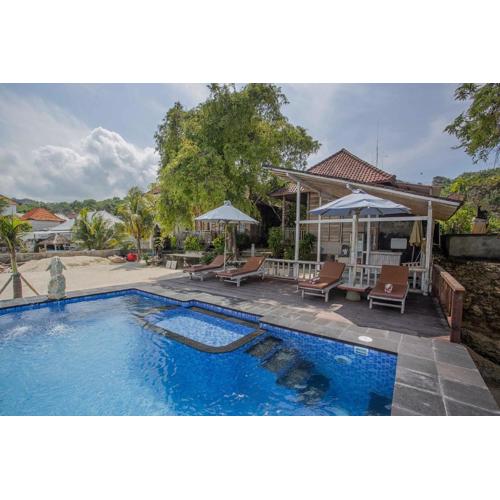 Wooden Beach Sunset Cottages