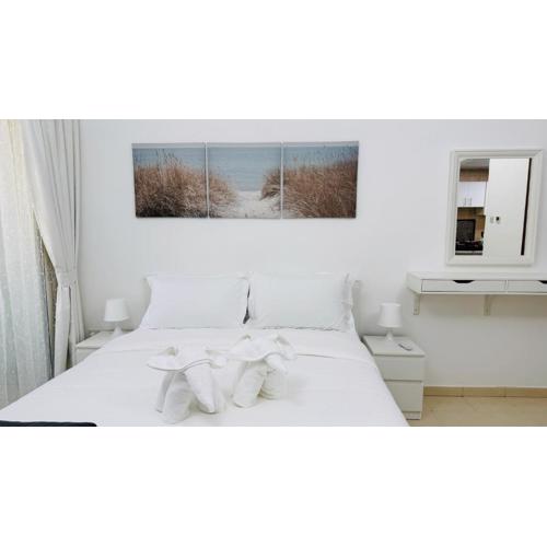 X11 Furnished with balcony England cluster international city near Dragon Mart